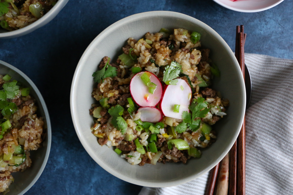 Beef and Ginger Fried Rice. Super easy to make and so flavorful and delicious! Top the fried rice with quick pickled radishes, or kimchi! Break out your wok and make this happen!