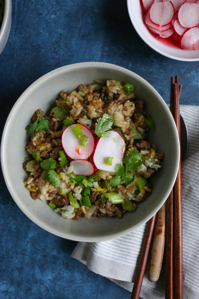 Beef and Ginger Fried Rice. Super easy to make and so flavorful and delicious! Top the fried rice with quick pickled radishes, or kimchi! Break out your wok and make this happen!