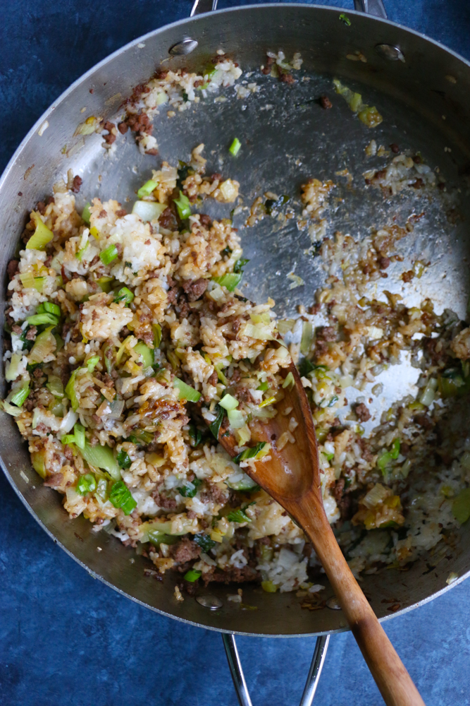 Beef and Ginger Fried Rice. Super easy to make and so flavorful and delicious! Top the fried rice with quick pickled radishes, or kimchi! Break out your wok and make this happen!