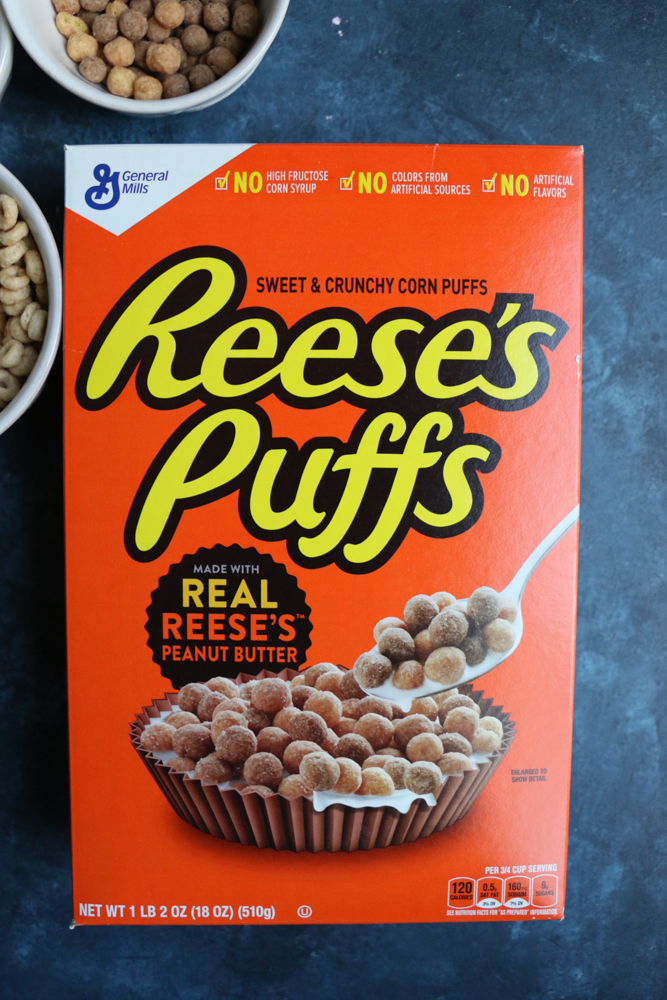 Cereal Apple Donuts! Fresh apple slices topped with peanut butter and almond butter and some of our favorite cereals from General Mills! The perfect summer snack!