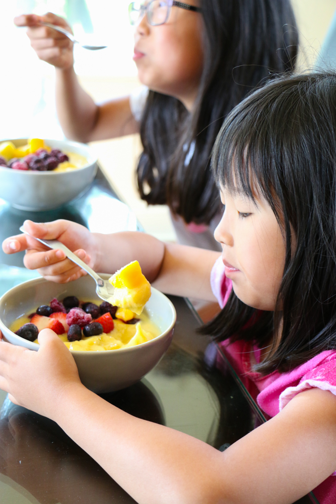 Delicious Mango Smoothie Bowl! A great way to start your morning! Packed with mangos, bananas and more! One cup of mangos provide 100% of your daily vitamin C, 35% of your daily vitamin A and 12% of your daily fiber!