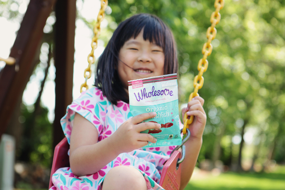 The perfect picnic! Take some time these last few weeks of summer, pack a lunch and head out with your kids! We packed our favorite pasta salad, raw veggies, fruit and my kids' favorite Wholesome Organic DelishFish candies.