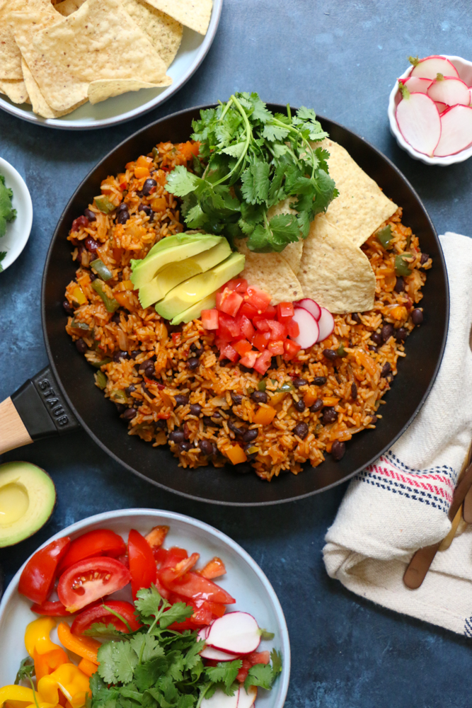 Rustic Mexican Rice & Beans Skillet Dinner! Change up Taco Tuesdays with this quick, easy and delicious dinner! Your family will love it!
