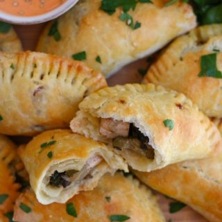 Tofu Empanadas! Stuffed with Nasoya's marinated baked tofu, spinach, zucchini, mushrooms and more, these flavorful and savory vegetarian empanadas are so good!