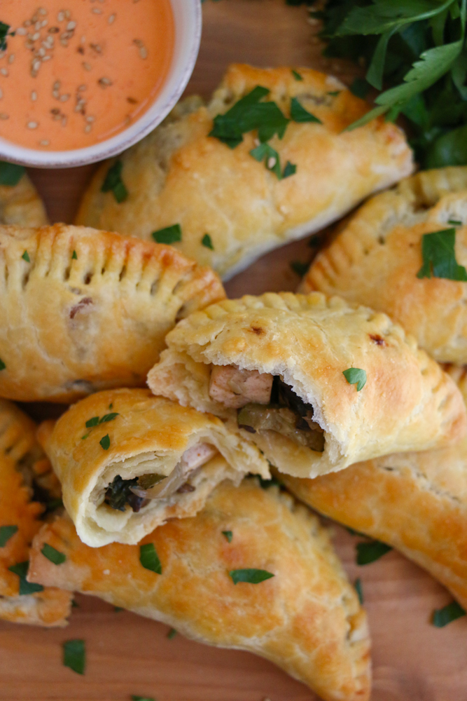 Tofu Empanadas! Stuffed with Nasoya's marinated baked tofu, spinach, zucchini, mushrooms and more, these flavorful and savory vegetarian empanadas are so good!