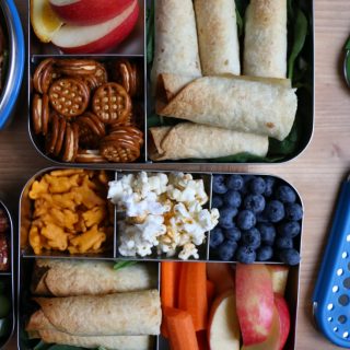 Chicken Veggie Taquitos + A Giveaway! BBQ baked shredded chicken and sauteed vegetables, rolled up into crispy, delicious BAKED taquitos! Great for packing into school lunches!