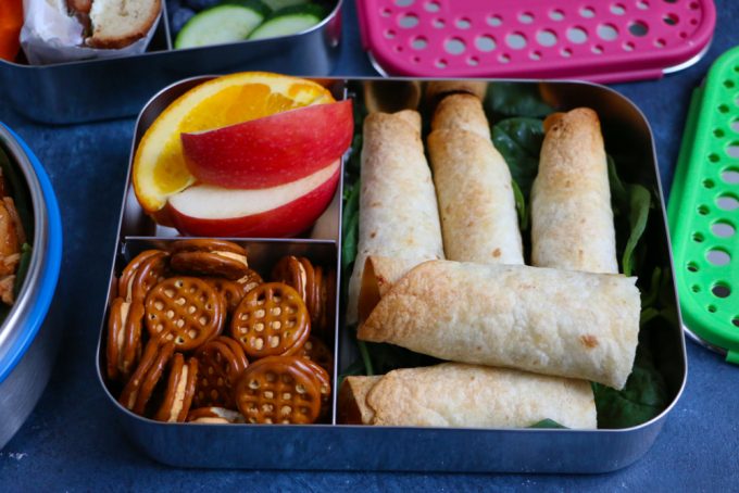 Chicken Veggie Taquitos + A Giveaway! BBQ baked shredded chicken and sauteed vegetables, rolled up into crispy, delicious BAKED taquitos! Great for packing into school lunches!