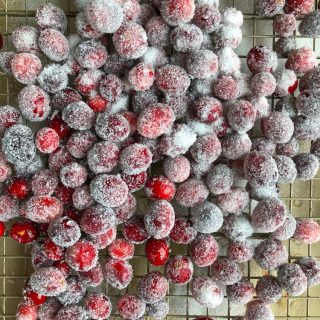 Sugared cranberries! The easiest, most festive way to decorate a holiday dessert, cocktail, or just to munch on!