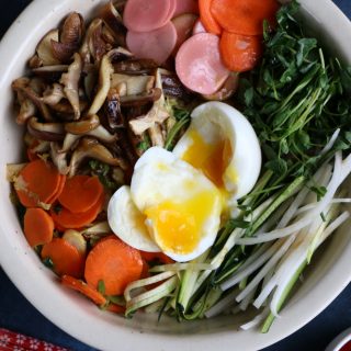 Bibim Grain Bowl. Completely inspired by a recent visit to Young Joni in Minneapolis, this grain bowl is filled with cooked farro, sautéed brussels sprouts, carrots, zucchini, shiitake mushrooms and more!