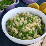 Spring Risotto with Asparagus and Peas! Spring is here! Celebrate the flavors and produce of spring by making this delicious and fabulous spring risotto! Asparagus, peas and hints of lemon, this risotto is amazing!