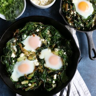 Green Shakshuka! Inspired by my recent trip to La Crosse, Wisconsin, this is a play on traditional shakshuka. This flavorful, bright green dish is made with leeks, Swiss chard, spinach, celery and more! You are going to love this! 