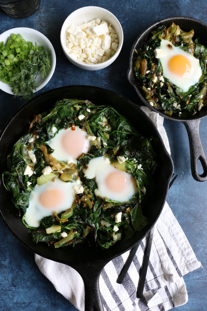 Green Shakshuka! Inspired by my recent trip to La Crosse, Wisconsin, this is a play on traditional shakshuka. This flavorful, bright green dish is made with leeks, Swiss chard, spinach, celery and more! You are going to love this!&nbsp;