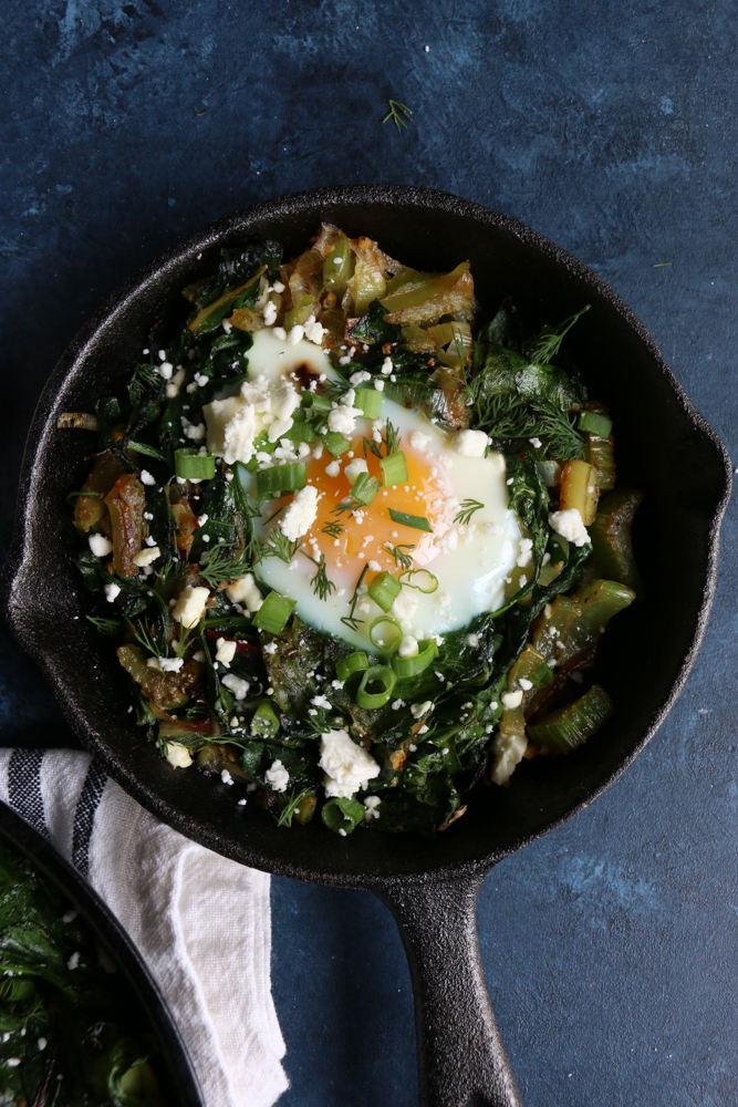 Green Shakshuka! Inspired by my recent trip to La Crosse, Wisconsin, this is a play on traditional shakshuka. This flavorful, bright green dish is made with leeks, Swiss chard, spinach, celery and more! You are going to love this!&nbsp;