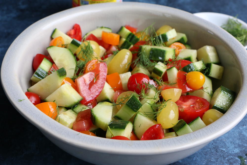 A bowl of Super Simple Cucumber Tomato Salad.