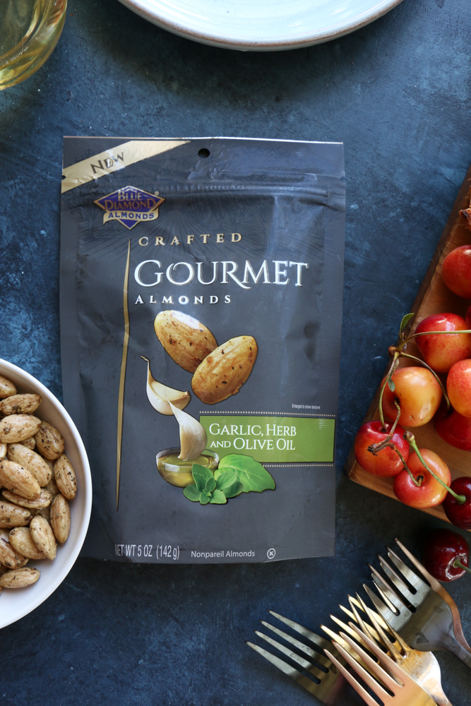 My Summer Cheese and Charcuterie Board with Blue Diamond Crafted Gourmet Garlic Herb and Olive Oil almonds! Summer entertaining is not complete without a cheese and charcuterie board like this!