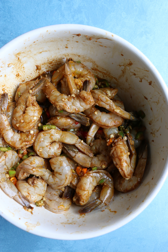 Coconut Shrimp Curry served over jasmine rice. Flavorful, delicious and with just the right amount of heat. You can also use this for chicken or veggies! You are going to love this!