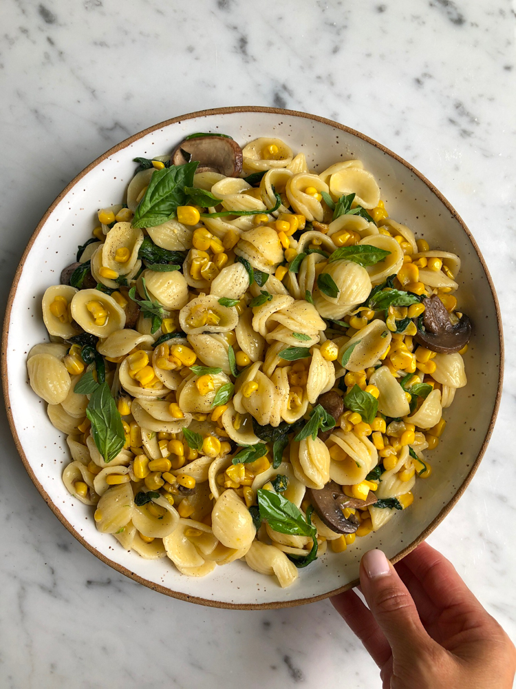 Orecchiette With Corn and Spinach!! Whether you are using up your last sweet summer corn or using frozen corn, this simple, easy and absolutely delicious pasta comes together in no time at all!&nbsp;