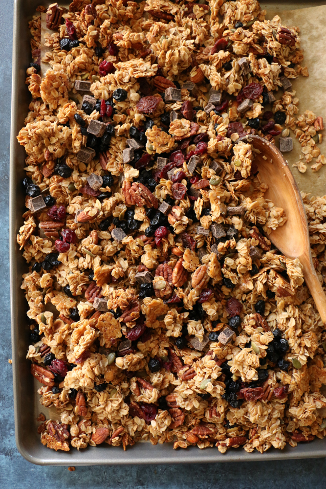 Gluten Free Granola!! Made with gluten free rolled oats, pecans, pepitas, dried fruit, coconut oil and naturally sweetened with some honey and maple syrup. You just can&rsquo;t beat freshly baked homemade granola! You&rsquo;ve got to try this!