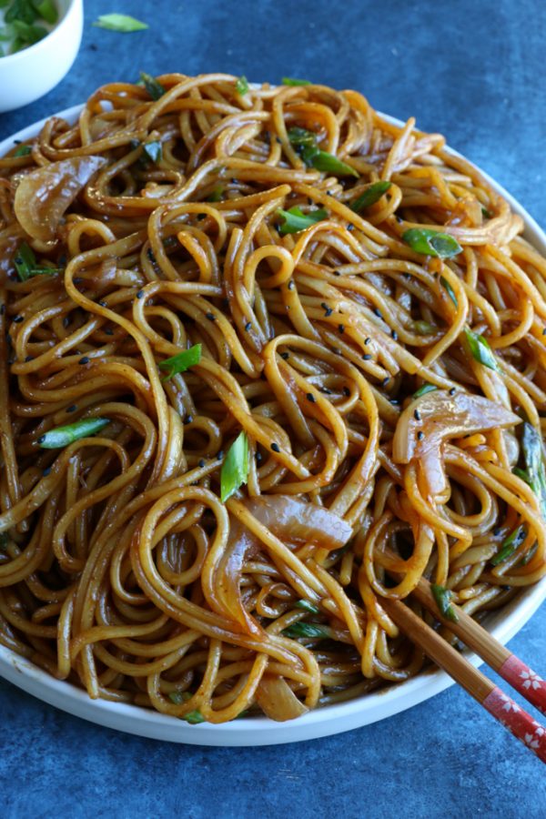 veggie lo mein on white plate