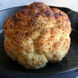 Whole Roasted Cauliflower with a light, spicy Asian dressing. Forget the side dish, this could be the star of your dinner table!