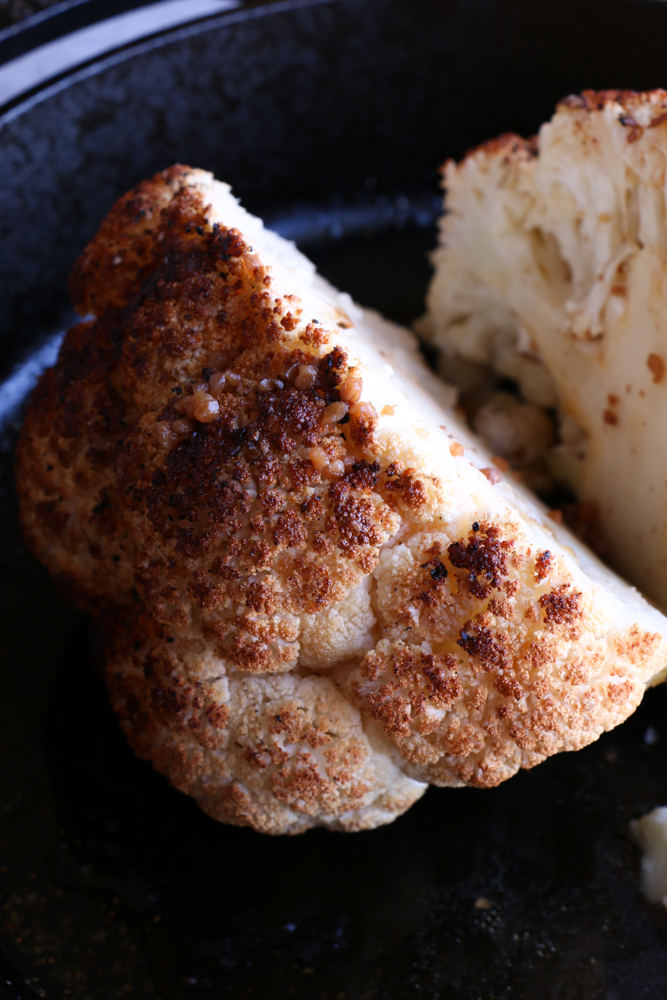 Whole Roasted Cauliflower with a light, spicy Asian dressing. Forget the side dish, this could be the star of your dinner table! This is incredible!&nbsp;
