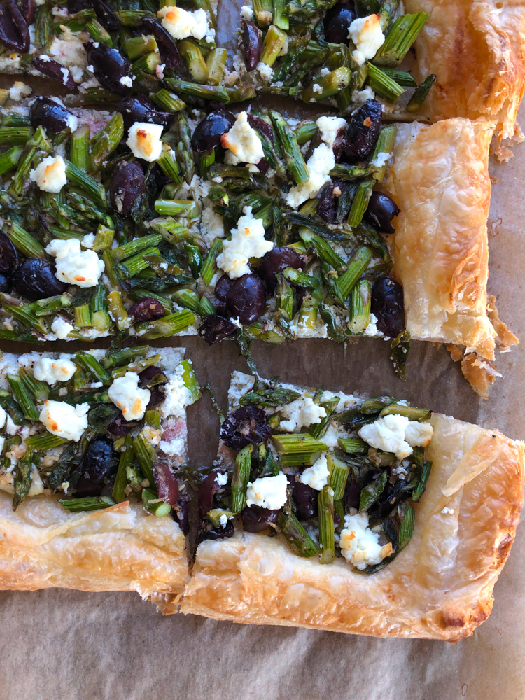 Asparagus Goat Cheese Tart! From America's Test Kitchen and Cook's Illustrated new cookbook, Vegetables Illustrated! Light, flakey and buttery and so much flavor from the asparagus, olives and goat cheese! You're going to love this!&nbsp;