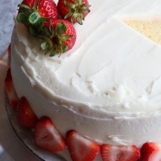 Vanilla Layer Cake with strawberries made with Land O Lakes® Butter with Canola Oil Spread! The perfect spring time treat!