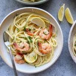 Shrimp Scampi with Pasta!! A simple garlic, white wine and butter sauce that is ready in minutes and is absolutely delicious! Add pasta or grab some crusty bread to soak up and devour this sauce! We hope you try this!