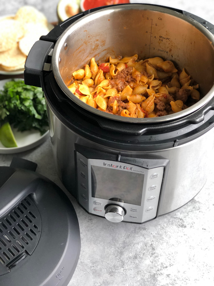 Instant Pot Cheesy Taco Pasta!! Creamy, so flavorful and delicious, easily made in the Instant Pot without pre-cooking the pasta!! 