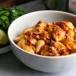 Instant Pot Cheesy Taco Pasta!! Creamy, so flavorful and delicious, easily made in the Instant Pot without pre-cooking the pasta!!