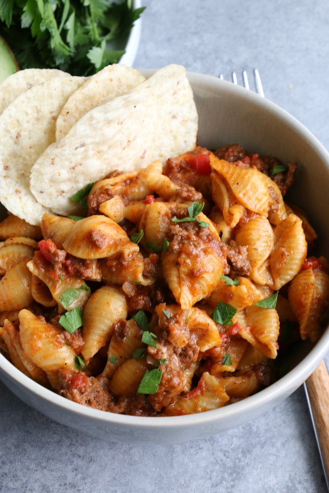 Instant Pot Cheesy Taco Pasta!! Creamy, so flavorful and delicious, easily made in the Instant Pot without pre-cooking the pasta!! 