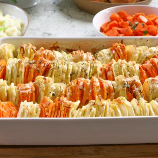 Sweet Potato and Parsnip Gratin! Savory and a delicious blend of sweet potatoes and parsnips, mixed with Gruyère and Parmesan cheese and more!