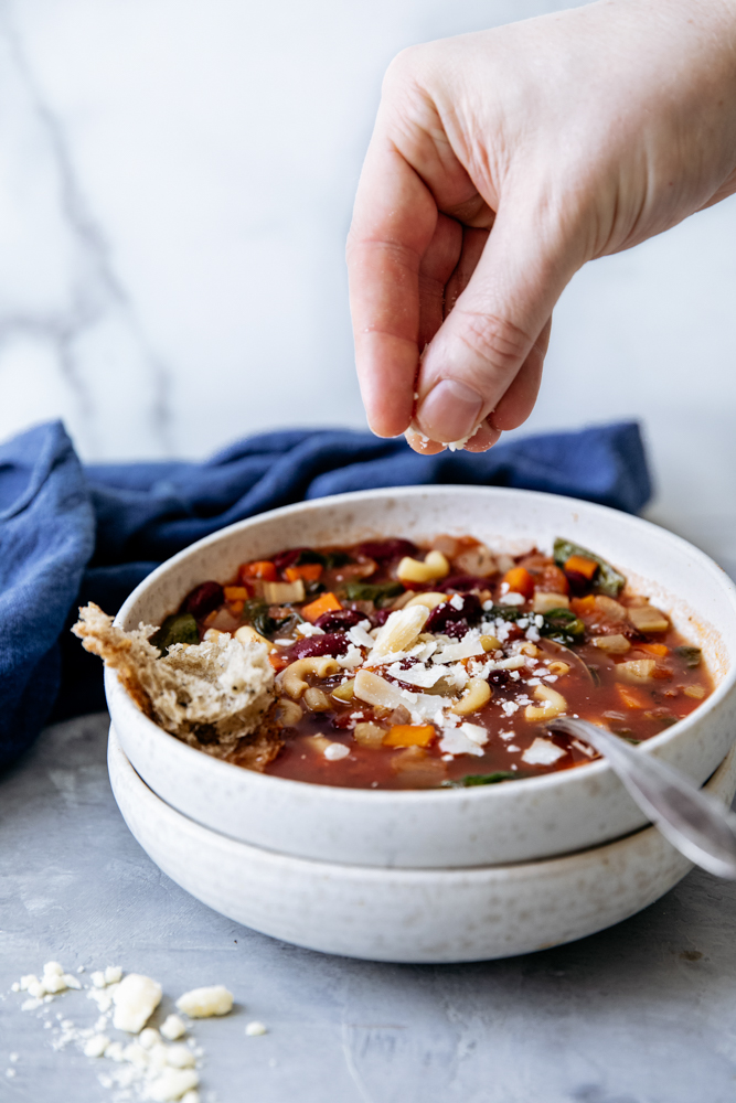 Minestrone Soup! Loaded with fresh vegetables, beans, and pasta, this soup is so comforting and delicious. No fail flavor booster included! 