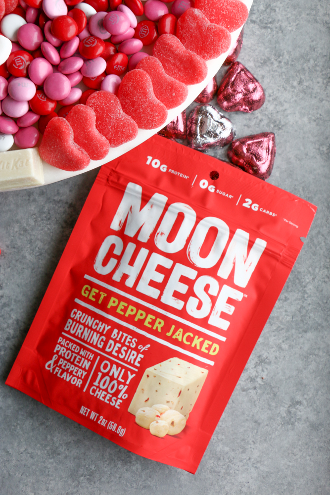 Treating myself a little this Valentine&rsquo;s Day!! This board is filled with all of our favorite things! Can you guess what&rsquo;s on the board? The tiny, crunchy bites of goodness is MOON CHEESE!