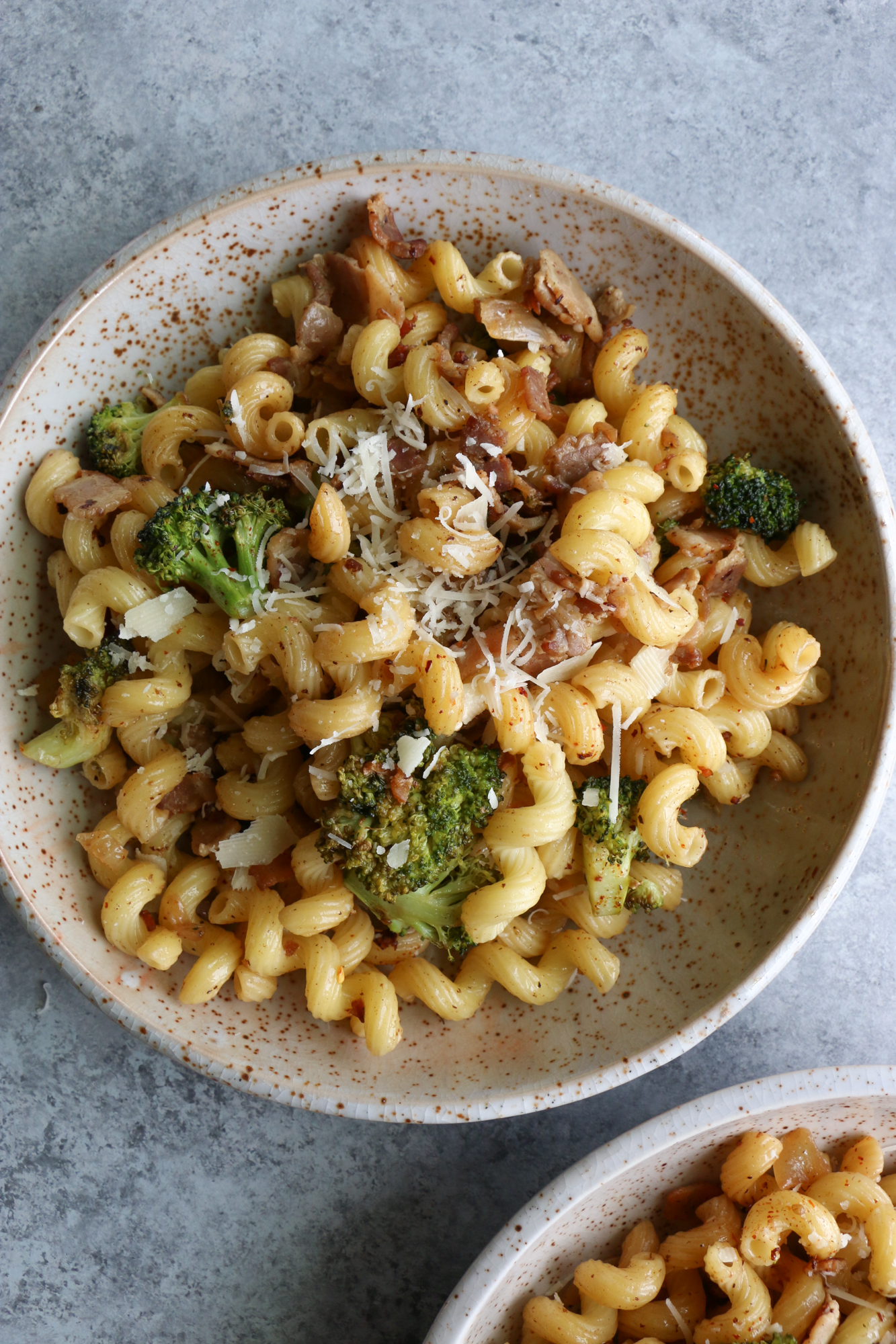 Cavatappi with Bacon and Roasted Broccoli. Quick, flavorful and so easy to make! We hope you give this recipe a try!