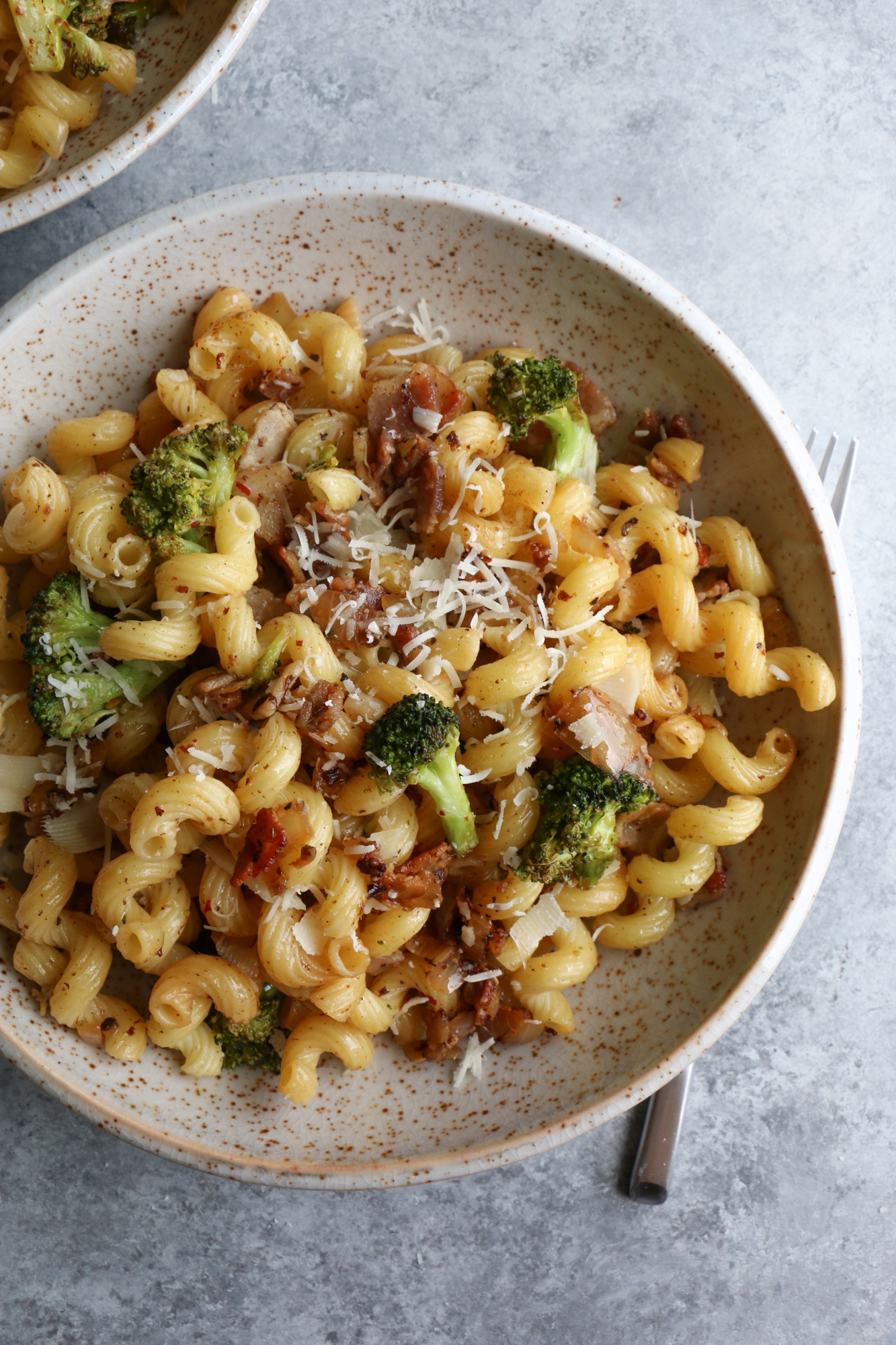 Cavatappi with Bacon and Roasted Broccoli. Quick, flavorful and so easy to make! We hope you give this recipe a try!