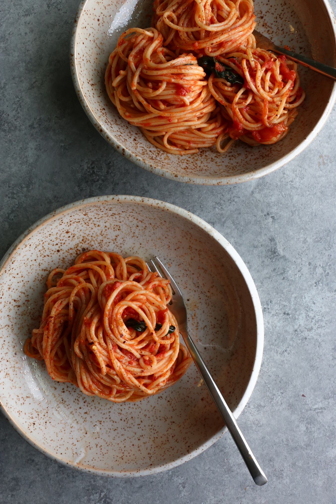 The Best Spaghetti Ever and so easy to make! This recipe uses garlic, olive oil, canned San Marzano tomatoes, butter and more. This might be my favorite way to east pasta now.