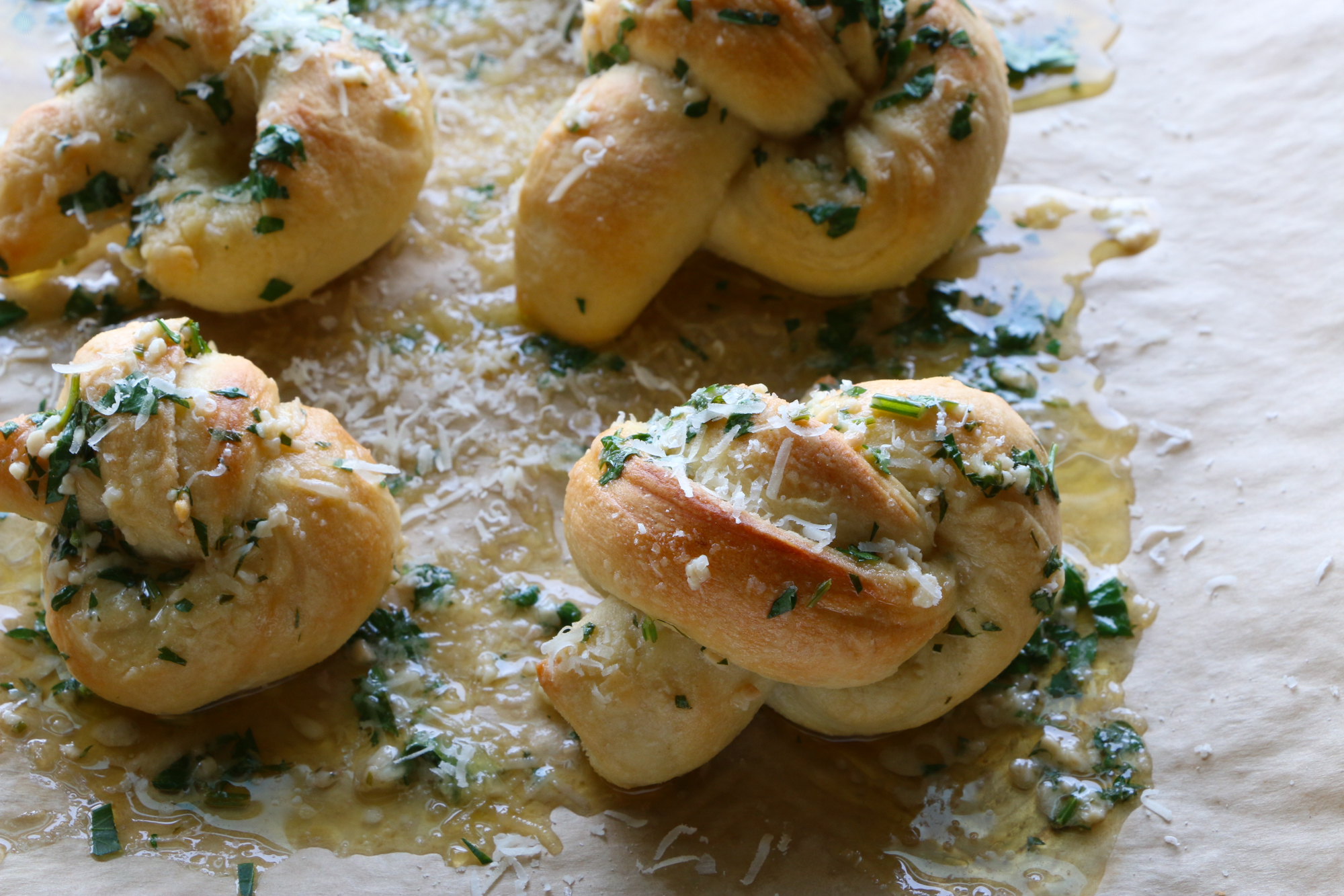 How To Make Parmesan Garlic Knots! So delicious and easy to make! Buttery, garlicky, cheesy goodness. You won't be able to resist these!