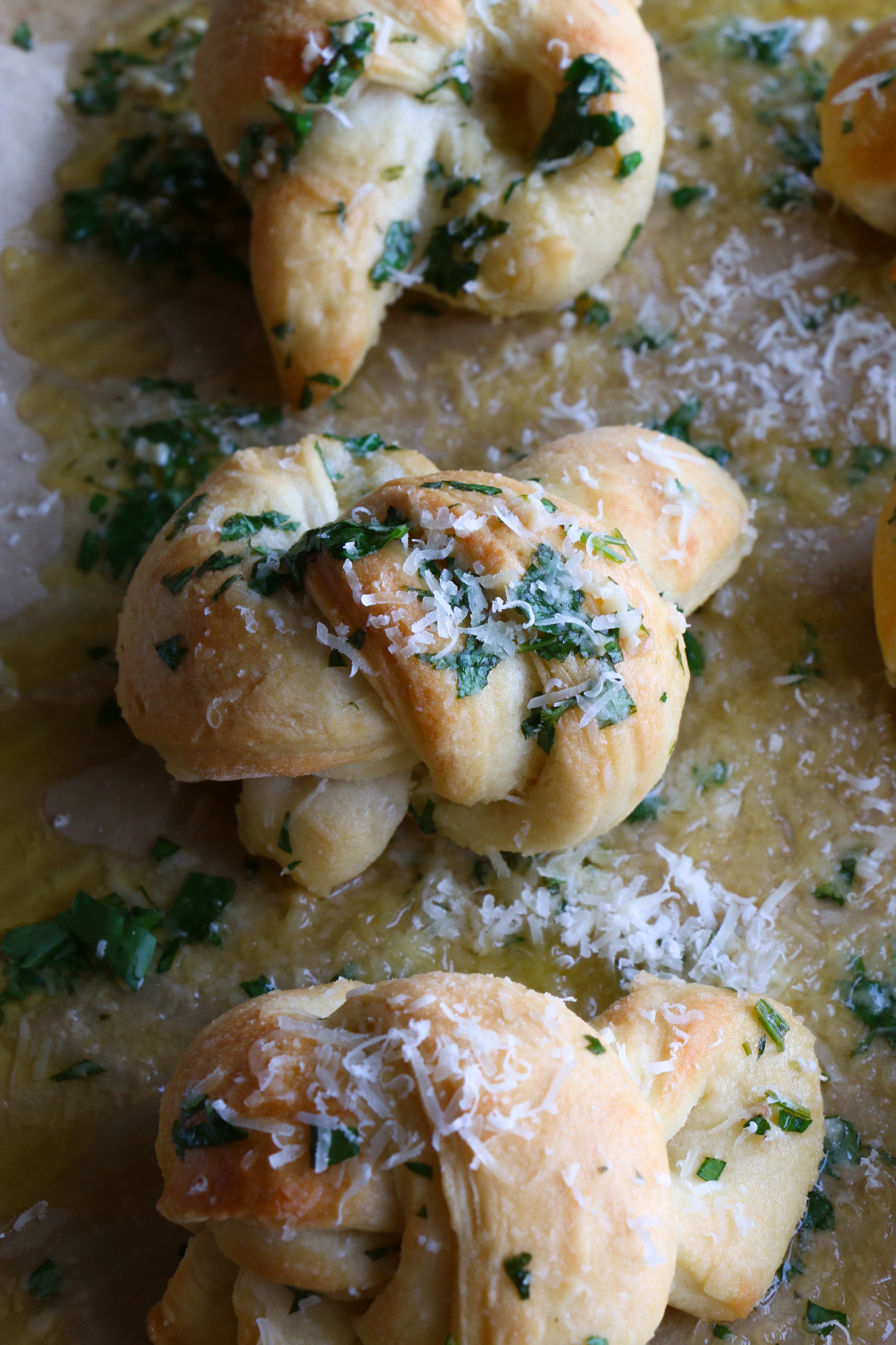 How To Make Parmesan Garlic Knots! So delicious and easy to make! Buttery, garlicky, cheesy goodness. You won't be able to resist these!