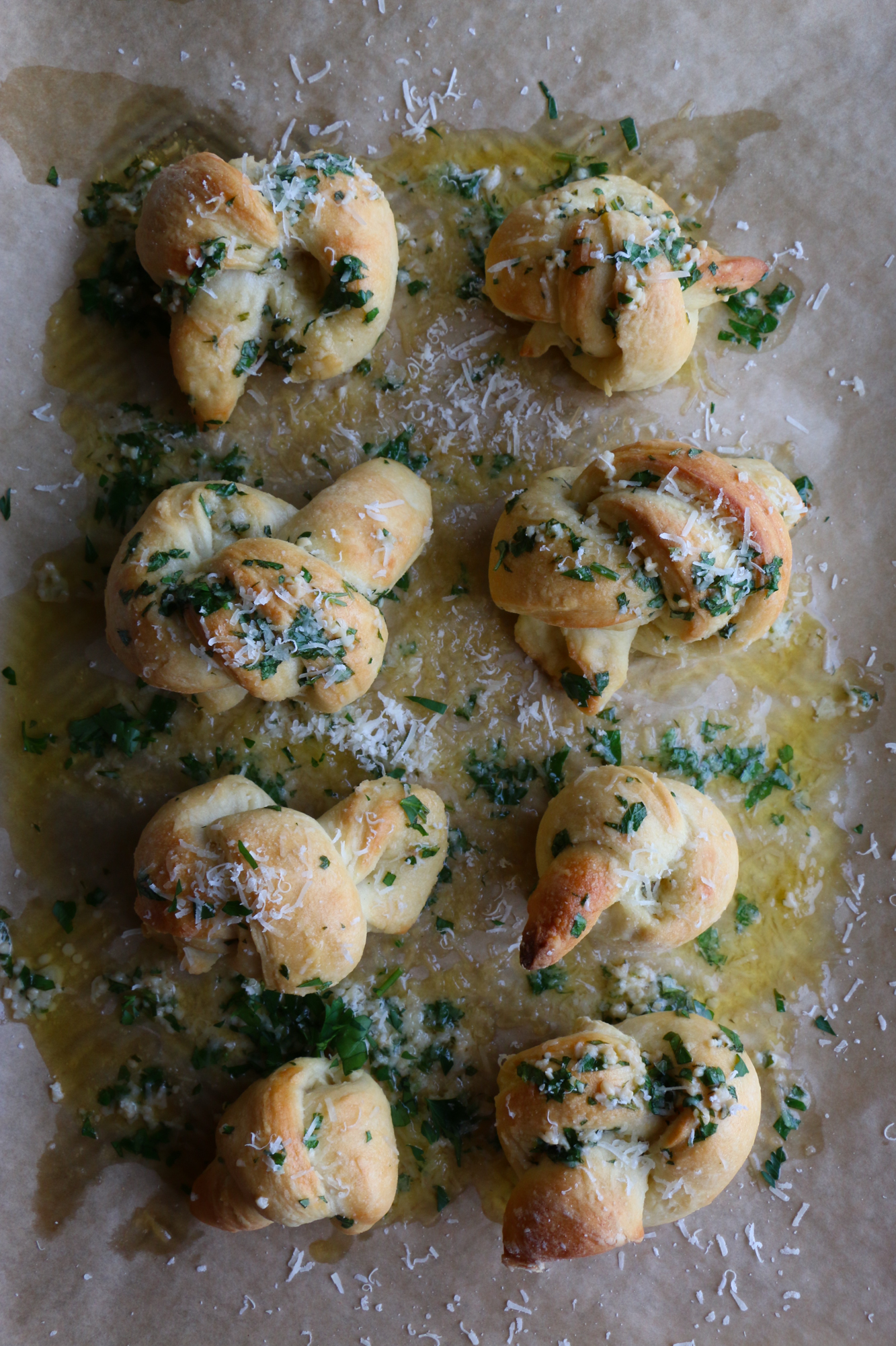 How To Make Parmesan Garlic Knots! So delicious and easy to make! Buttery, garlicky, cheesy goodness. You won't be able to resist these!