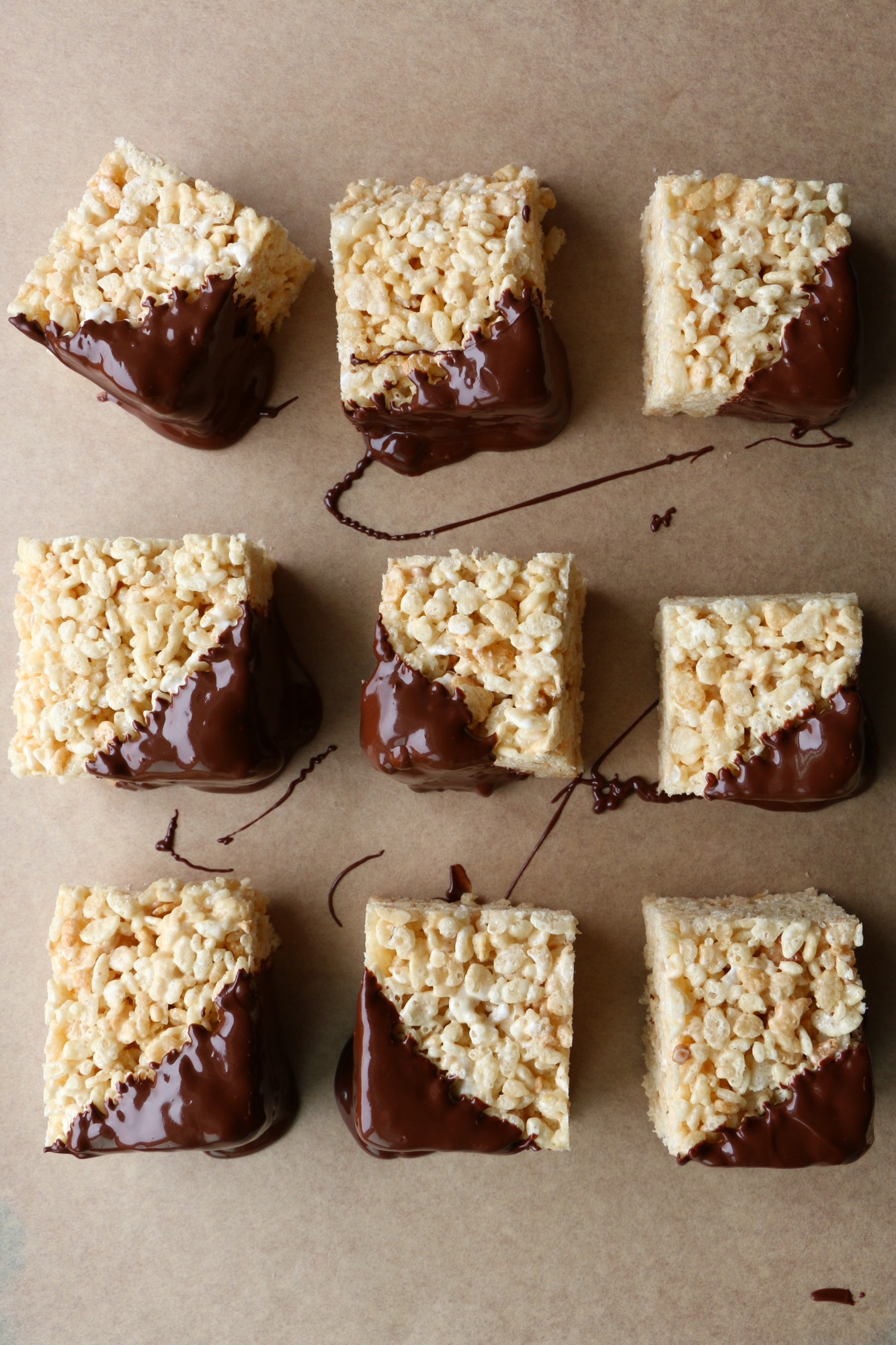 Peanut Butter Rice Krispie Treats with Chocolate! These are so easy to make! Mix it up by adding peanut butter and dipping into chocolate.