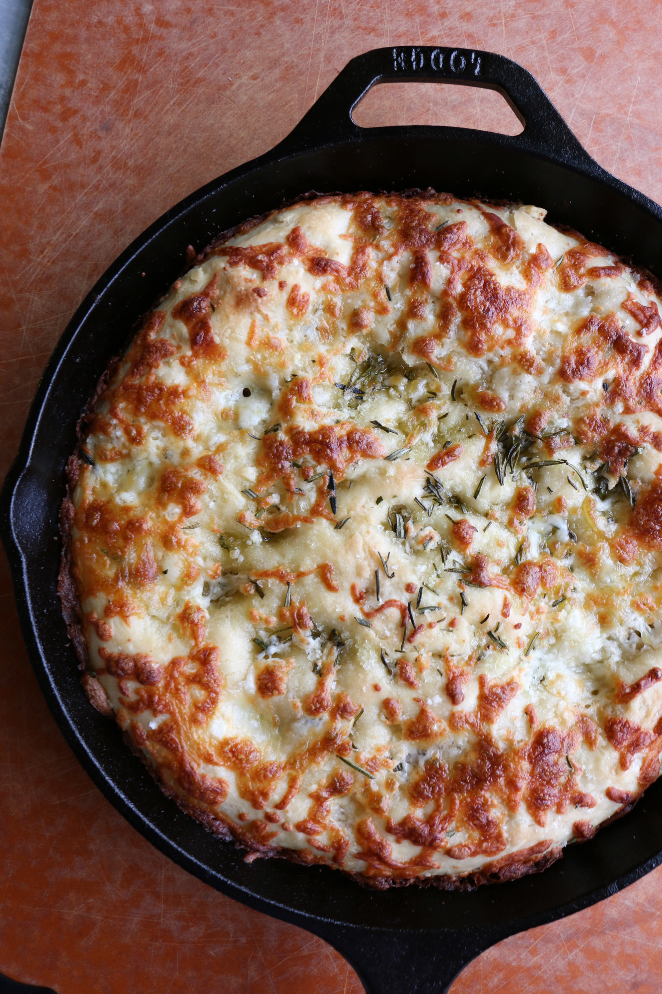 Rosemary Focaccia Bread using the pan pizza dough recipe from Food 52. This recipe takes time but is so worth it and super versatile. Try this if you like crispy edges and a pillowy, fluffy center for your dough. It's so good!