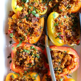 Stuffed Peppers with Beef Paella! Filling, delicious and nutritious, bell peppers are a great vehicle for pasta, rice, vegetables and more!