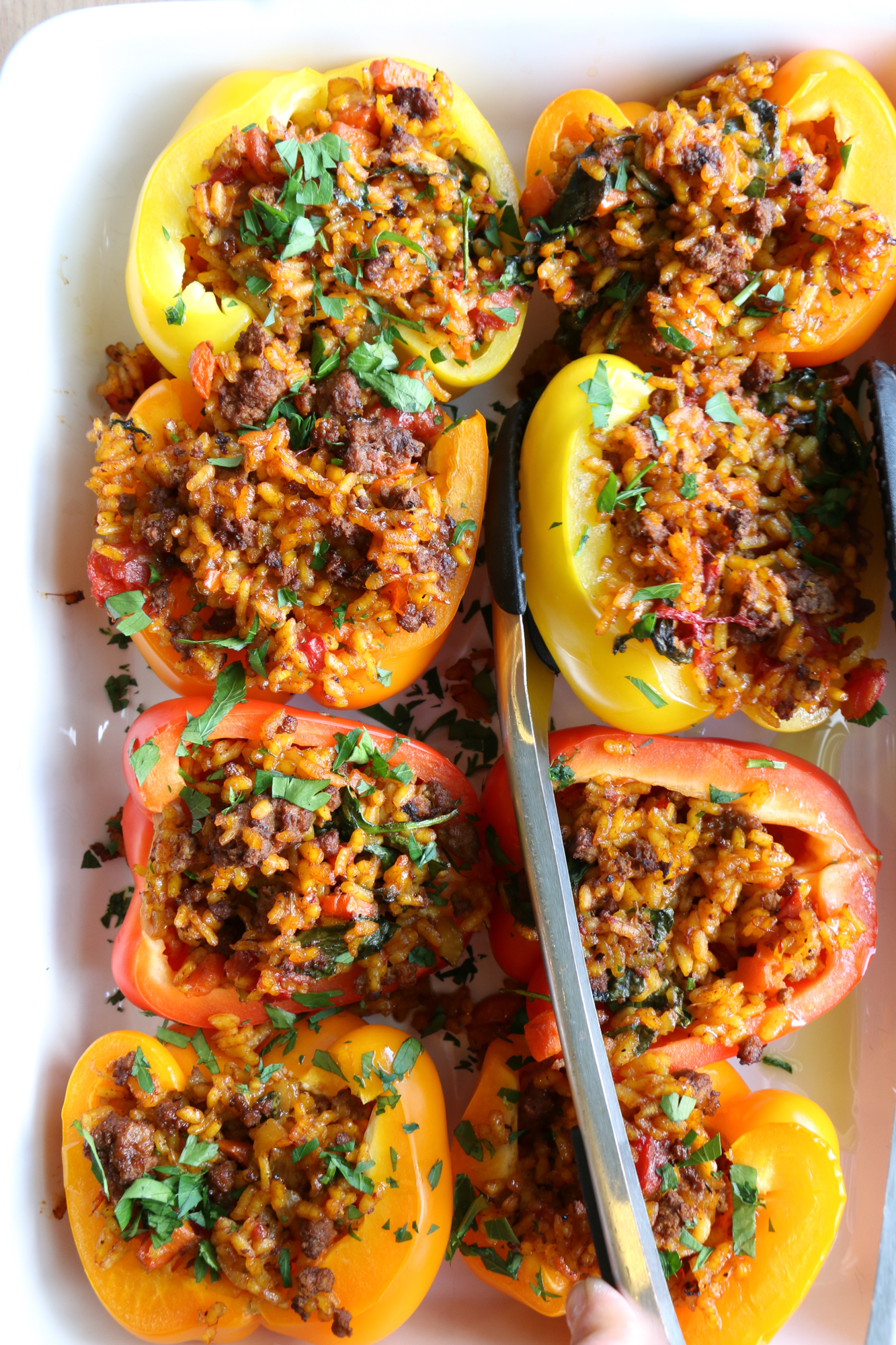 Stuffed Peppers with Beef Paella! Filling, delicious and nutritious, bell peppers are a great vehicle for pasta, rice, vegetables and more!