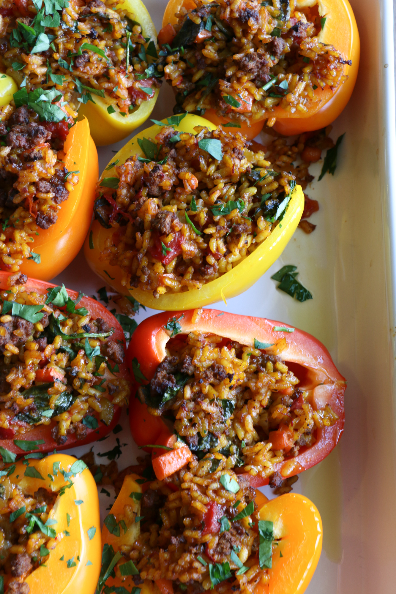 Stuffed Peppers with Beef Paella! Filling, delicious and nutritious, bell peppers are a great vehicle for pasta, rice, vegetables and more!