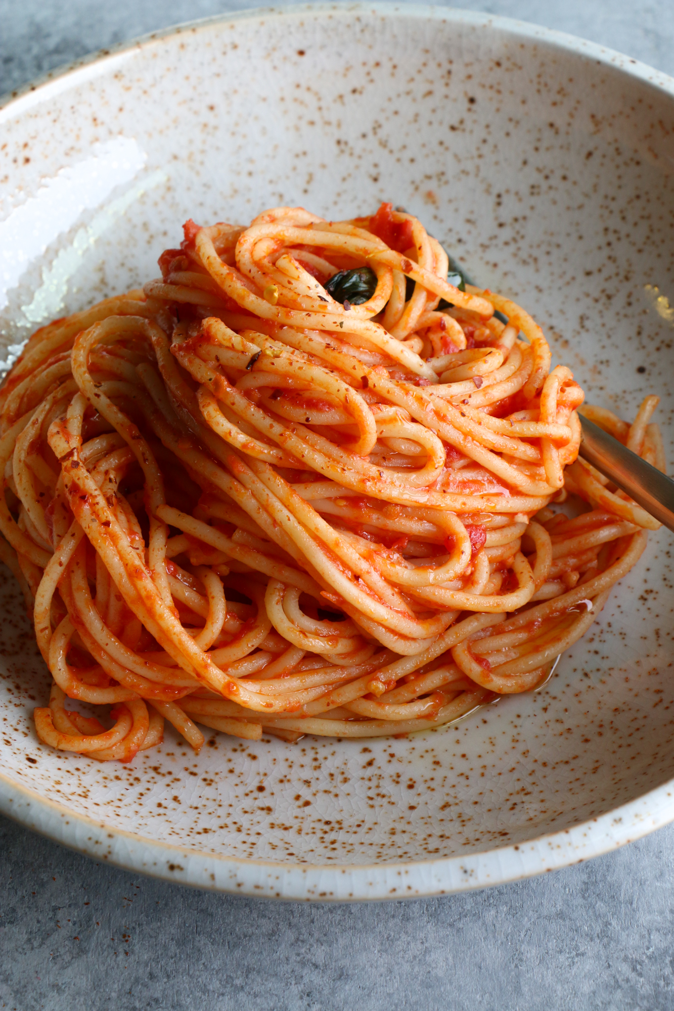 The Best Spaghetti Ever and so easy to make! This recipe uses garlic, olive oil, canned San Marzano tomatoes, butter and more. Make this! 