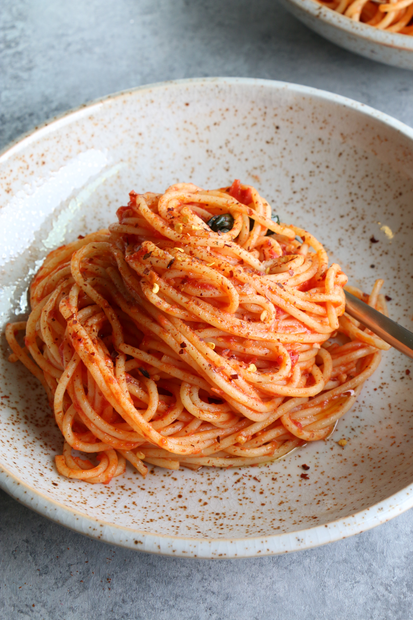 The Best Spaghetti Ever and so easy to make! This recipe uses garlic, olive oil, canned San Marzano tomatoes, butter and more. This might be my favorite way to east pasta now.