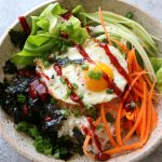 How To Make Breakfast Bibimbap! Filled with just some raw veggies and topped with a fried egg, this is one breakfast you will love!