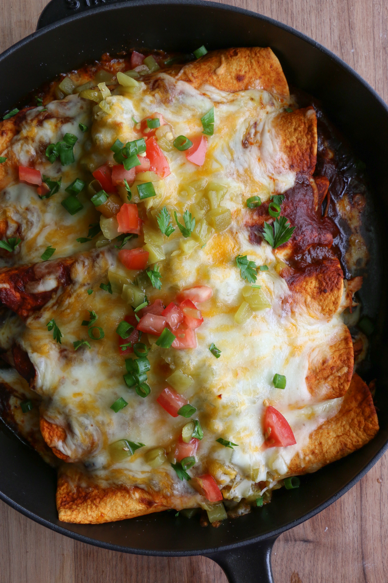 Chicken and Black Bean Enchiladas! Small batch enchiladas made with flour tortillas, roast chicken, black beans and enchilada sauce, so good!