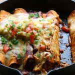 Chicken and Black Bean Enchiladas! Small batch enchiladas made with flour tortillas, roast chicken, black beans and enchilada sauce, so good!